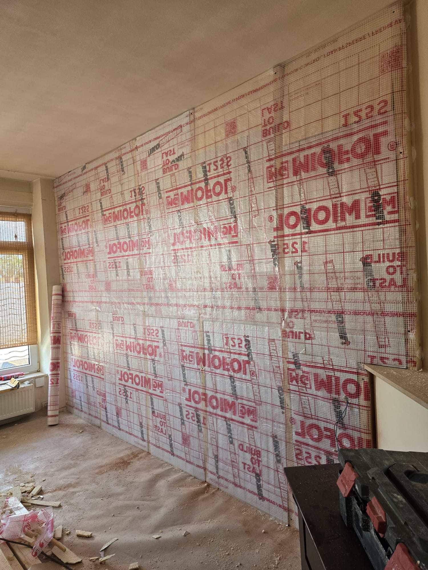 Nieuwe wand plaatsen huis verbouwing in Rotterdam